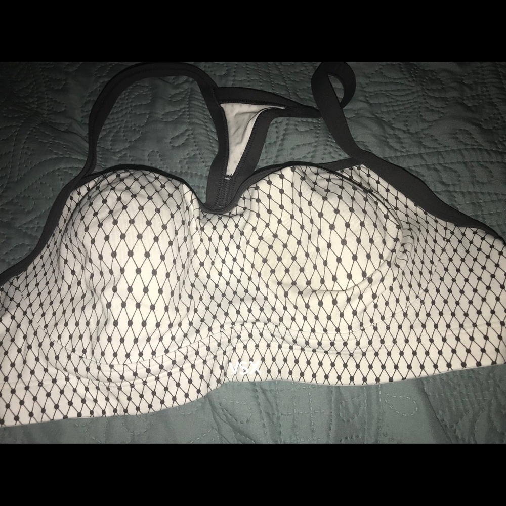 Never worn Victoria’s Secret workout bra. 36C
